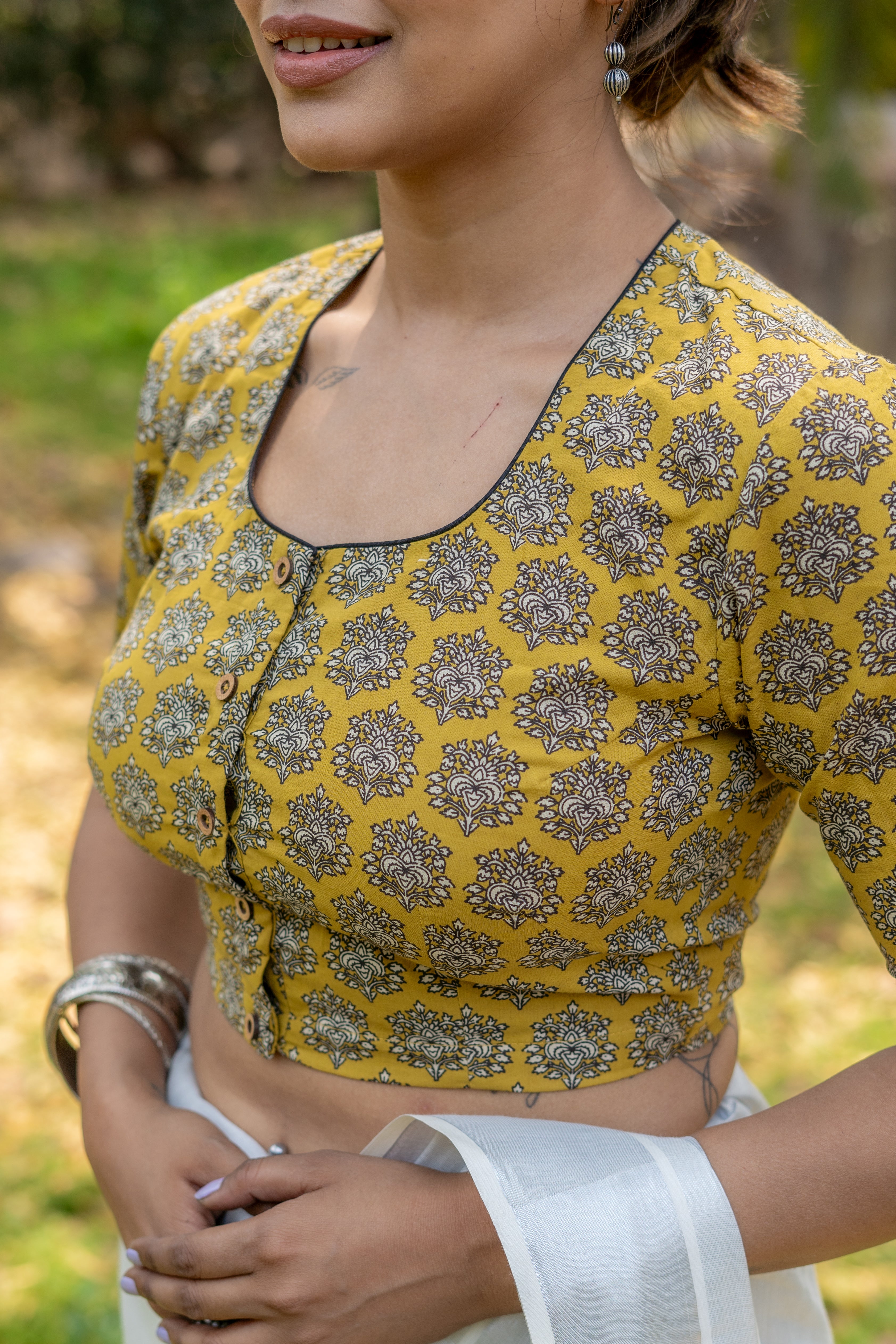 Mustard bagru handblock booti round neck cotton blouse with black piping