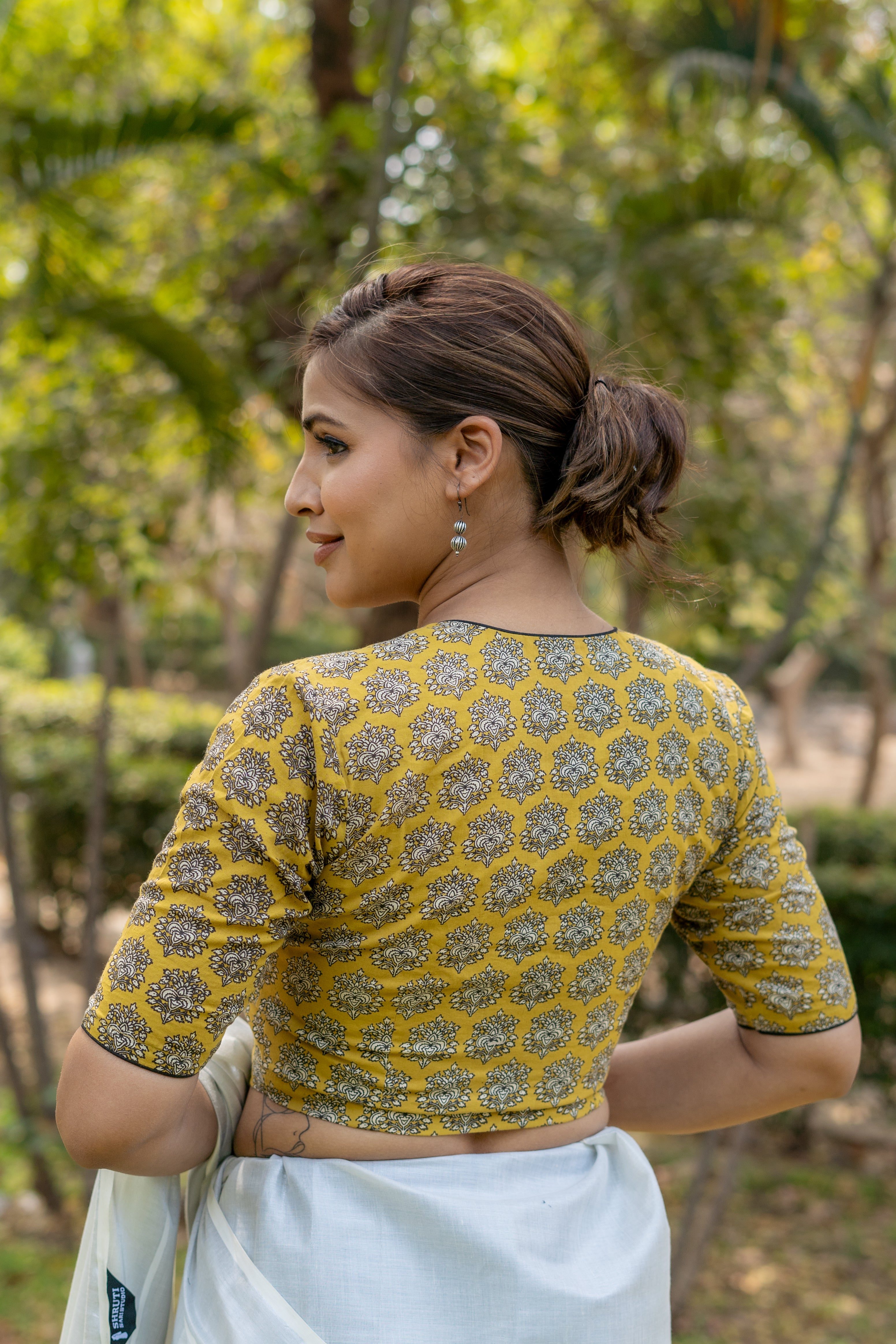 Mustard bagru handblock booti round neck cotton blouse with black piping