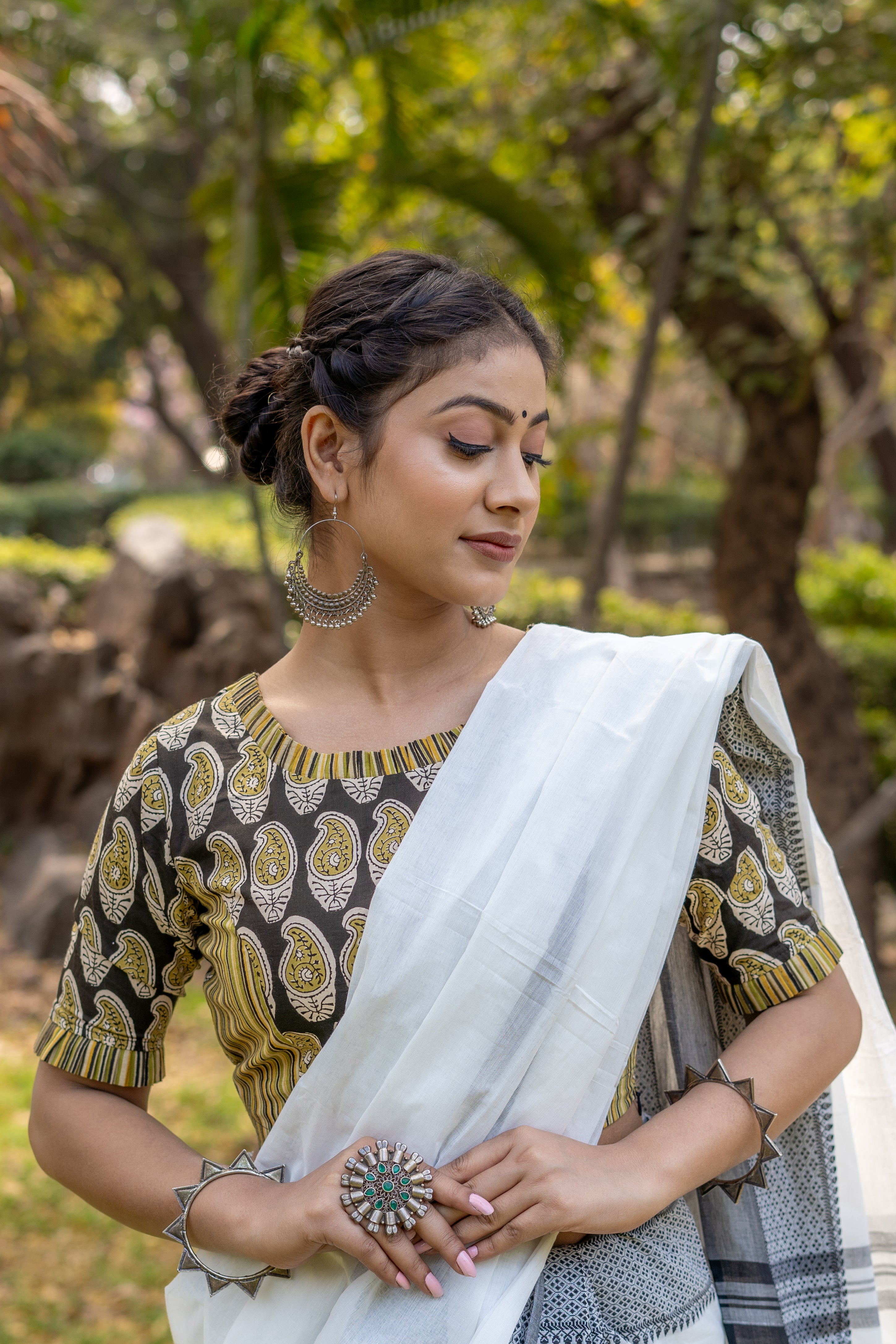 Olive and black handblock paisley print round neck cotton blouse with frills on neck and sleeves