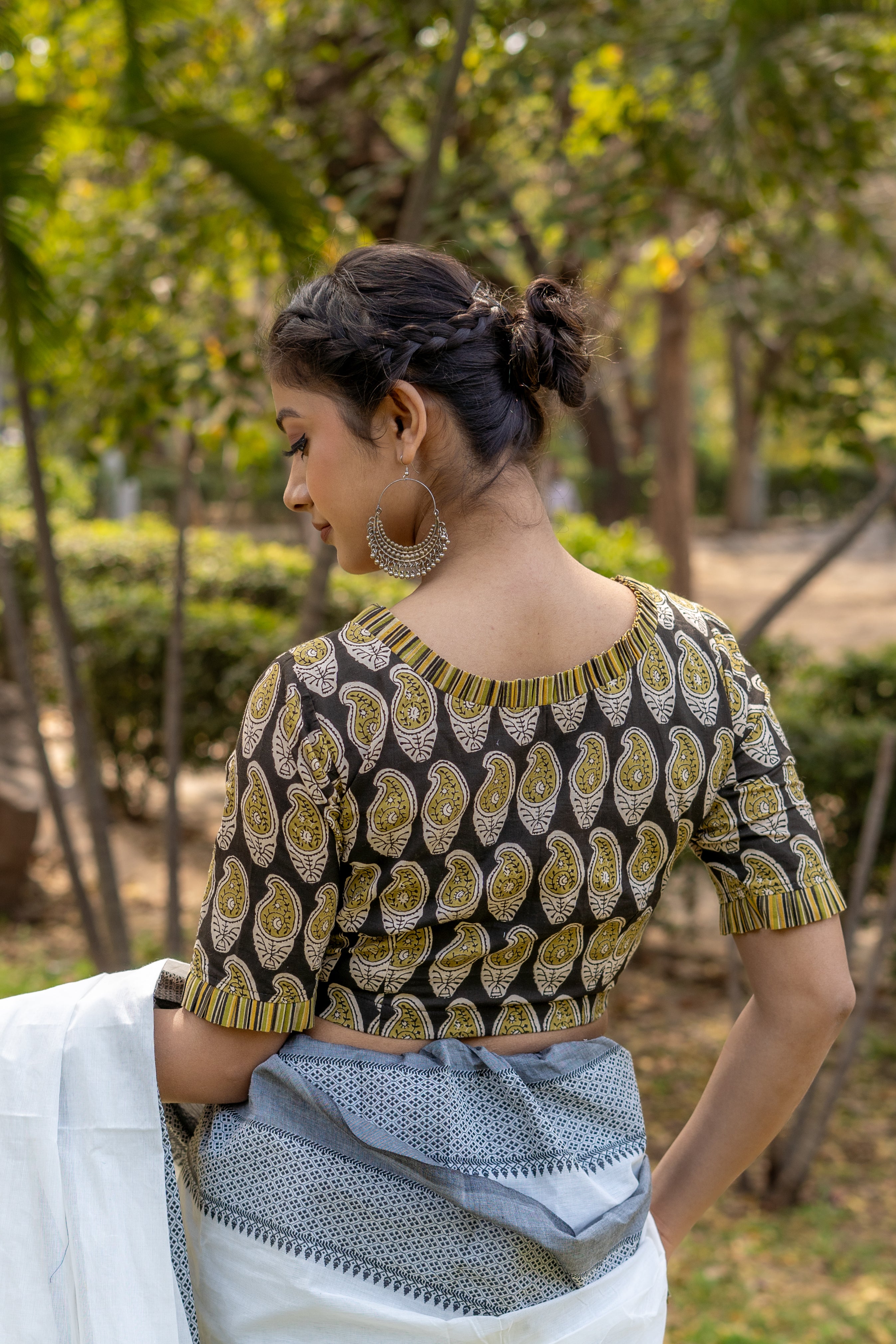Olive and black handblock paisley print round neck cotton blouse with frills on neck and sleeves