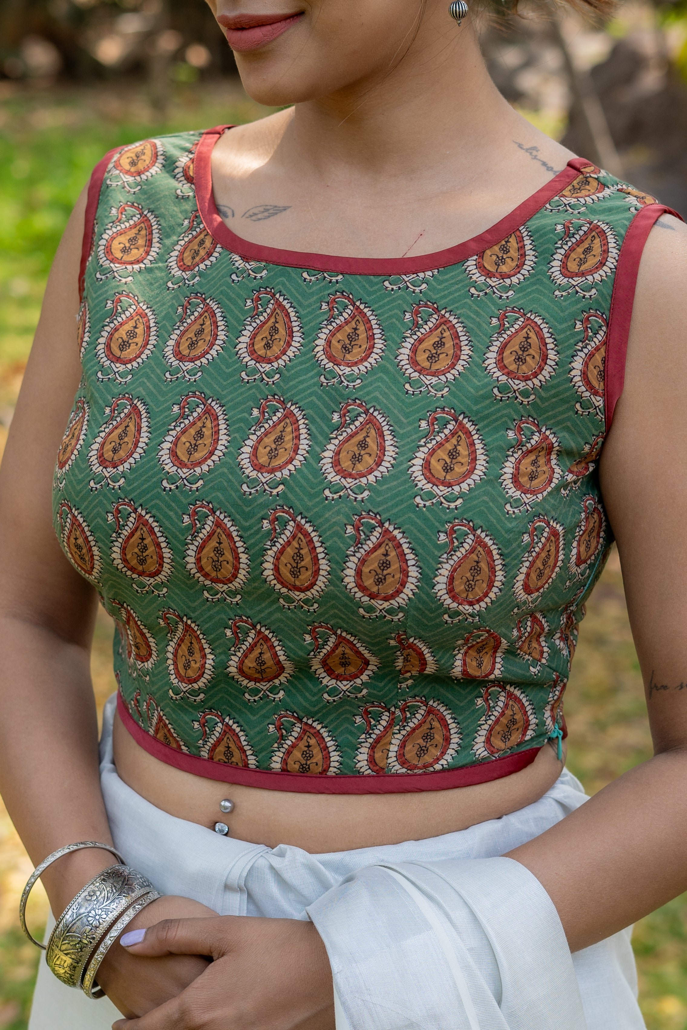 Green bagru paisley handblock print sleeveless cotton blouse with brown piping