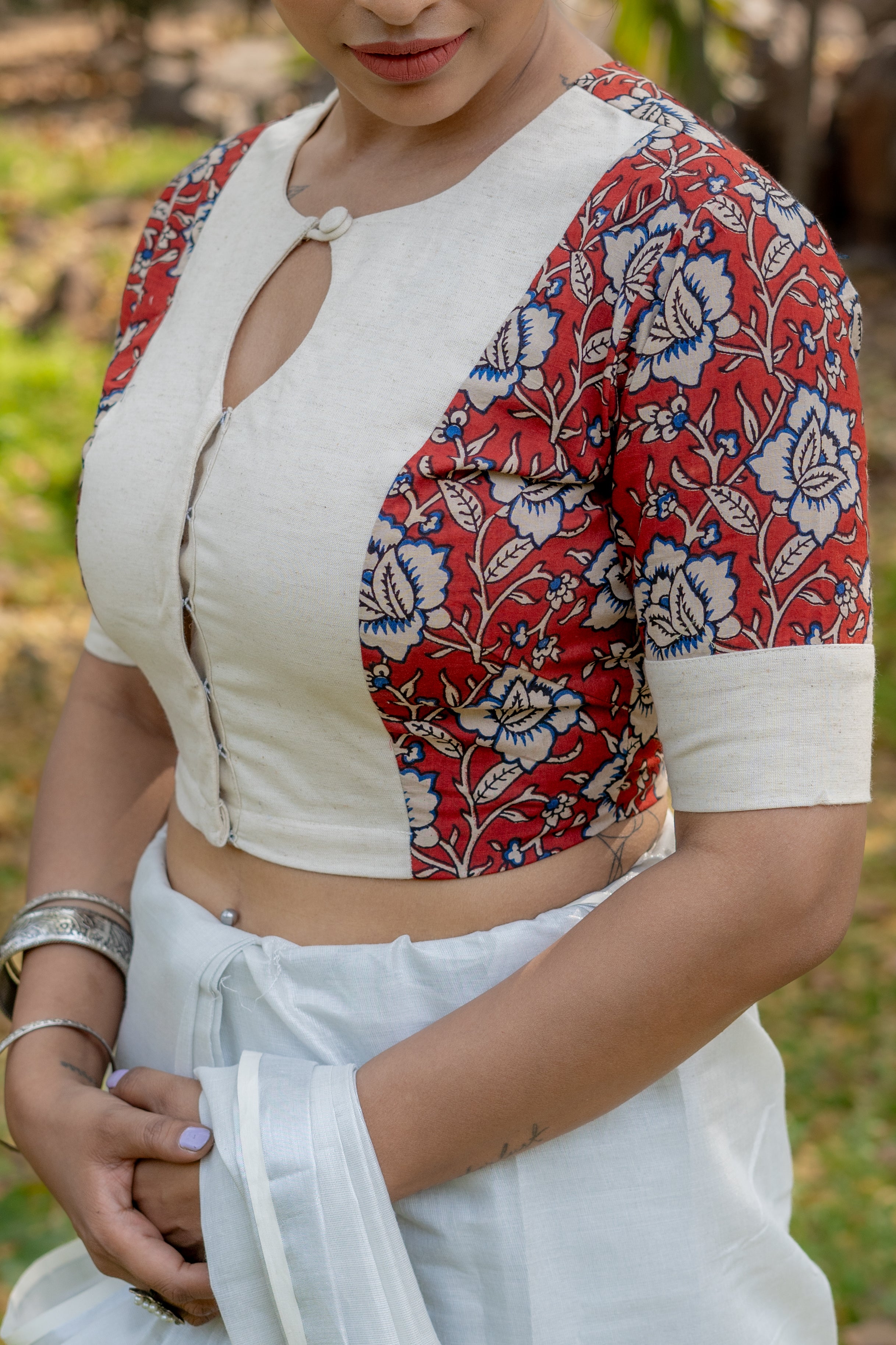 White cotton blouse with red kalamkari print on sleeves