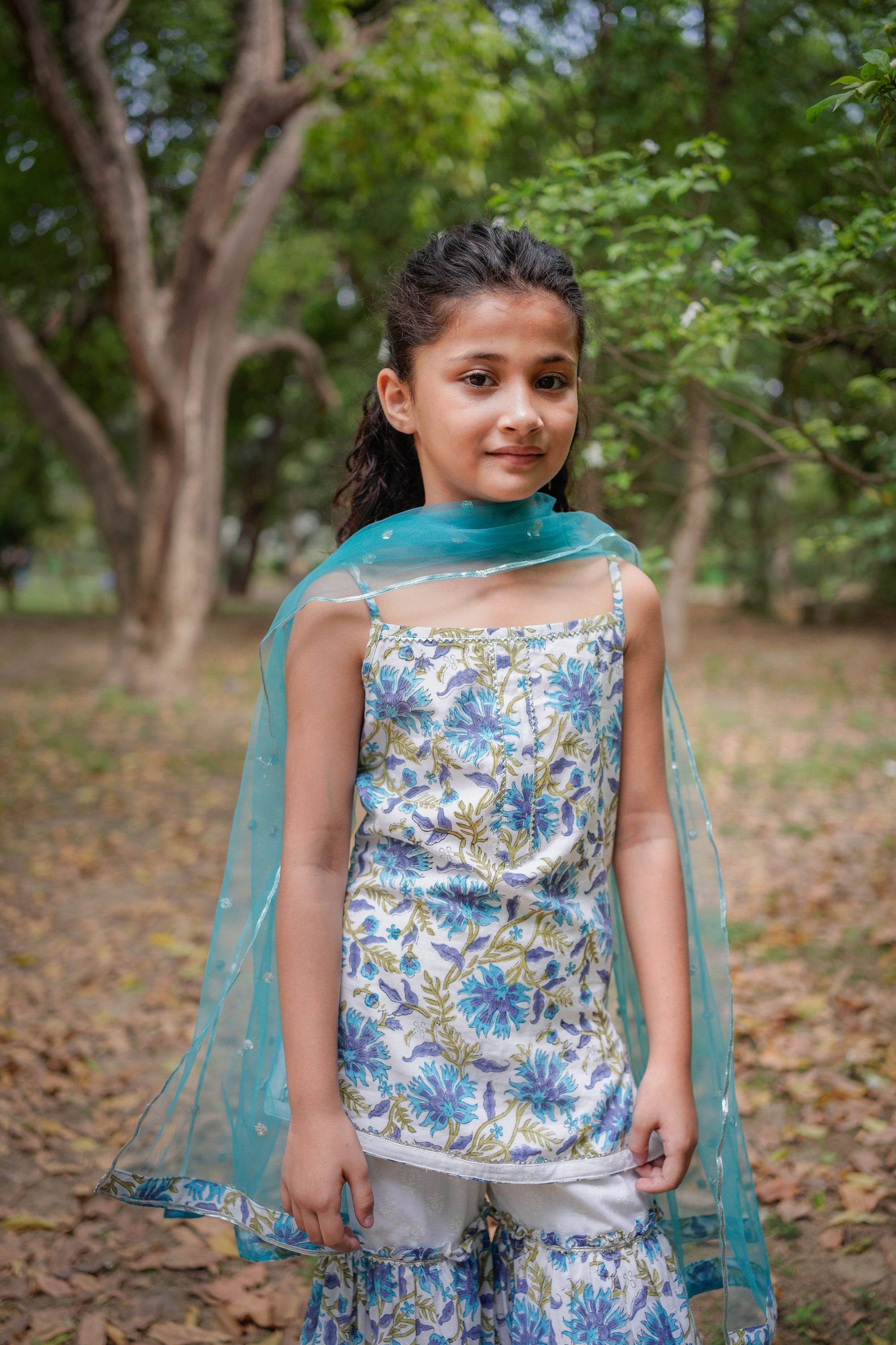 White with Blue Sanganeri Top with White Sharara & Blue Dupatta