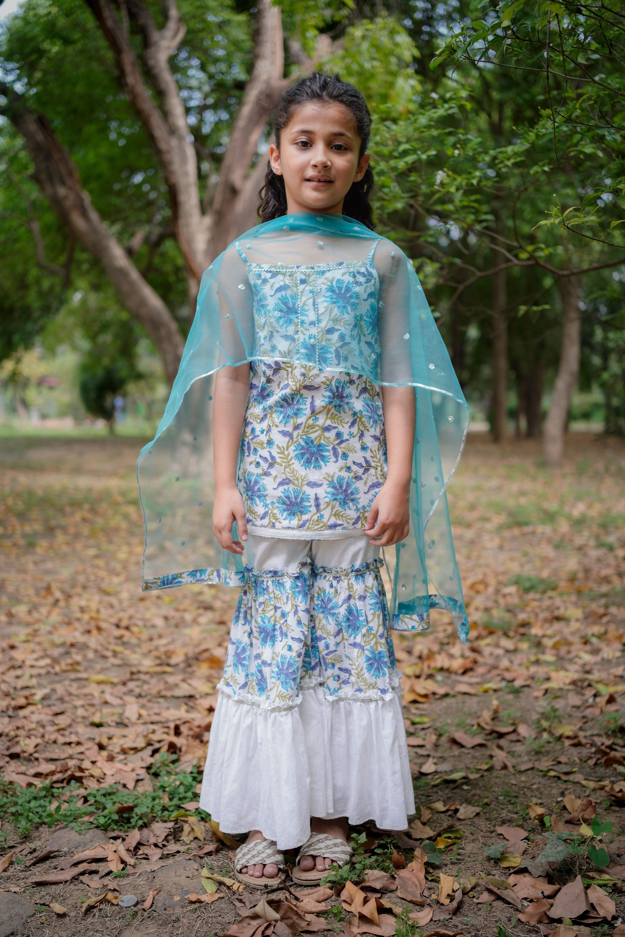 White with Blue Sanganeri Top with White Sharara & Blue Dupatta