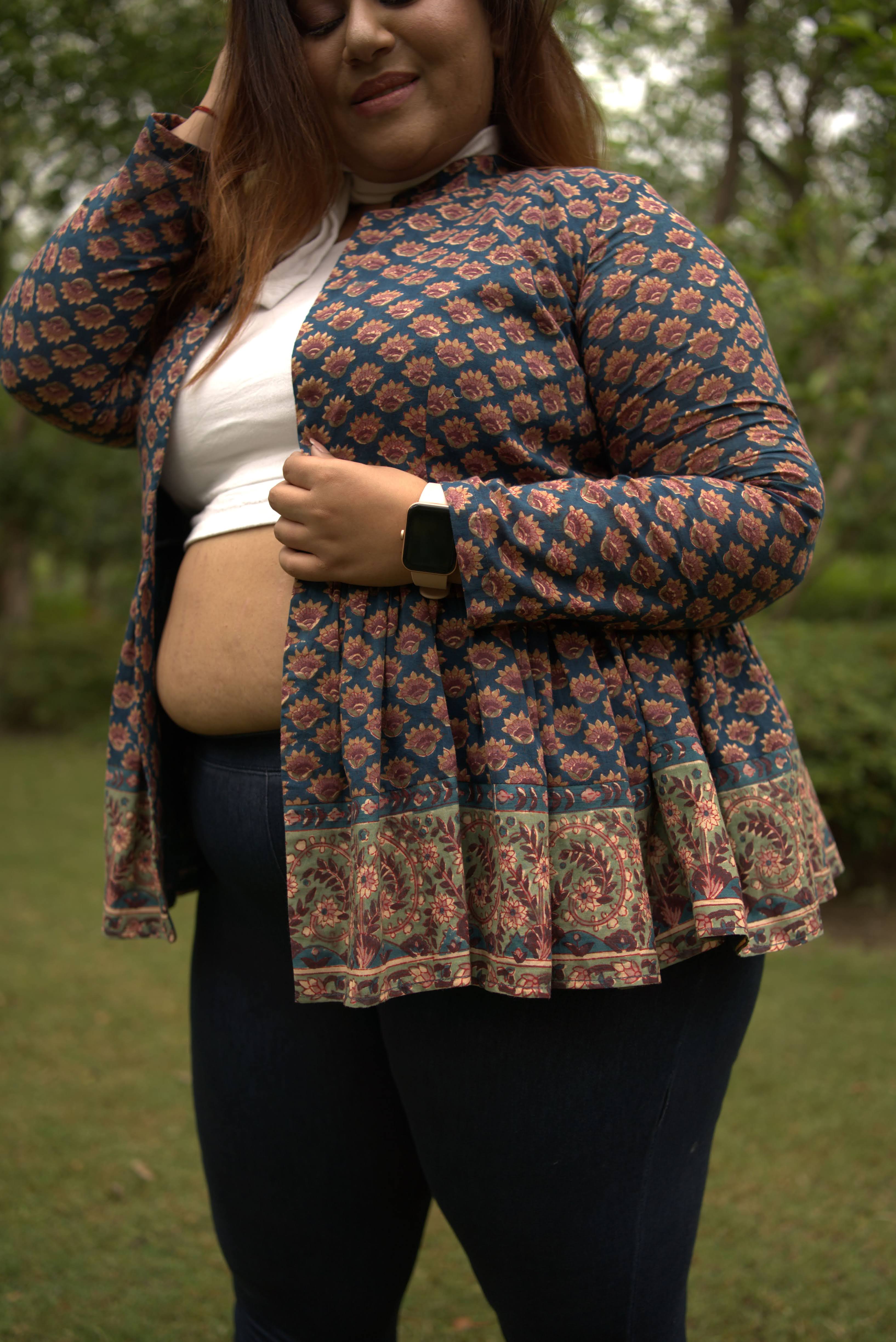 Sea green sanganeri peplum style shrug
