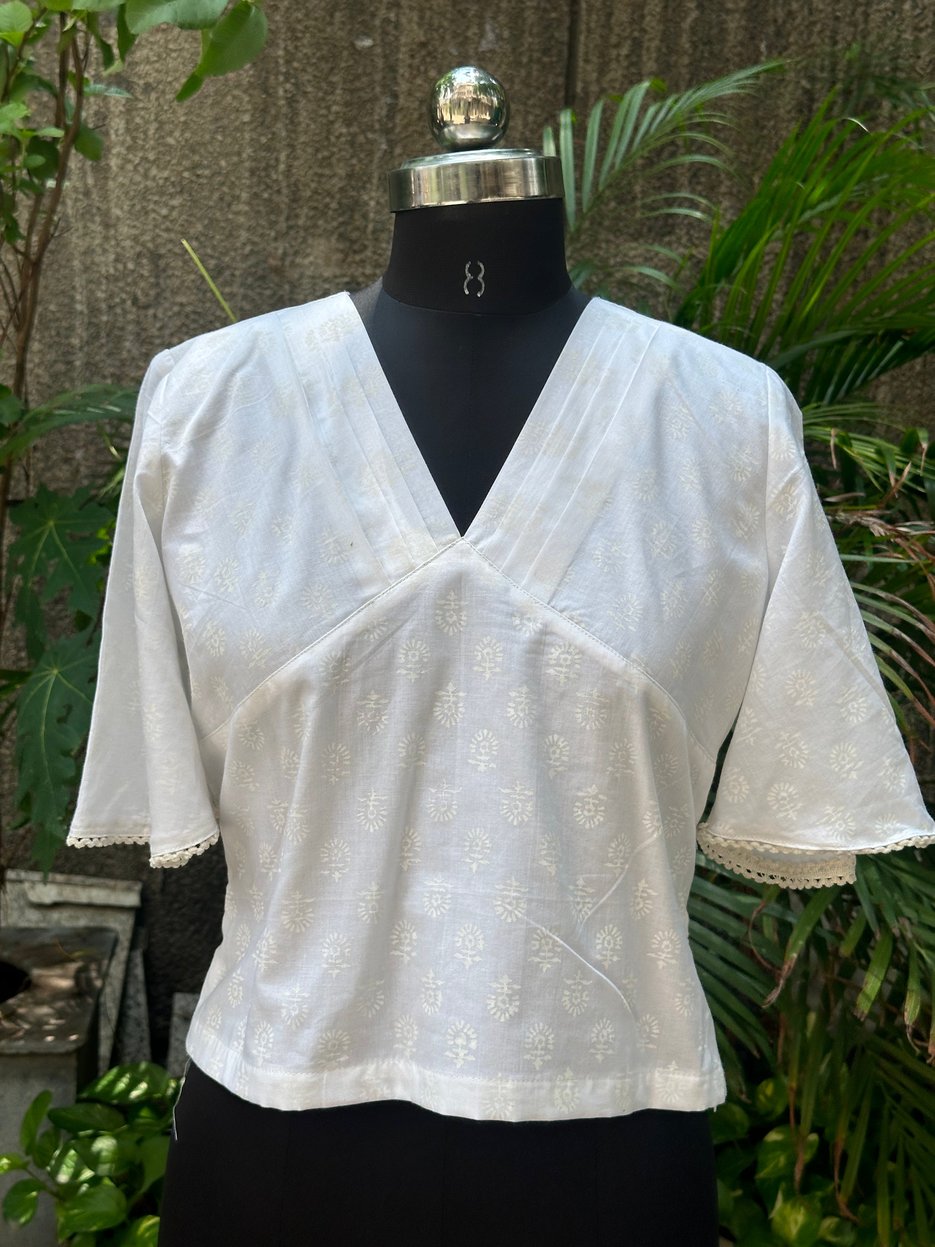 White handblock print V-neck cotton top with butterfly sleeves