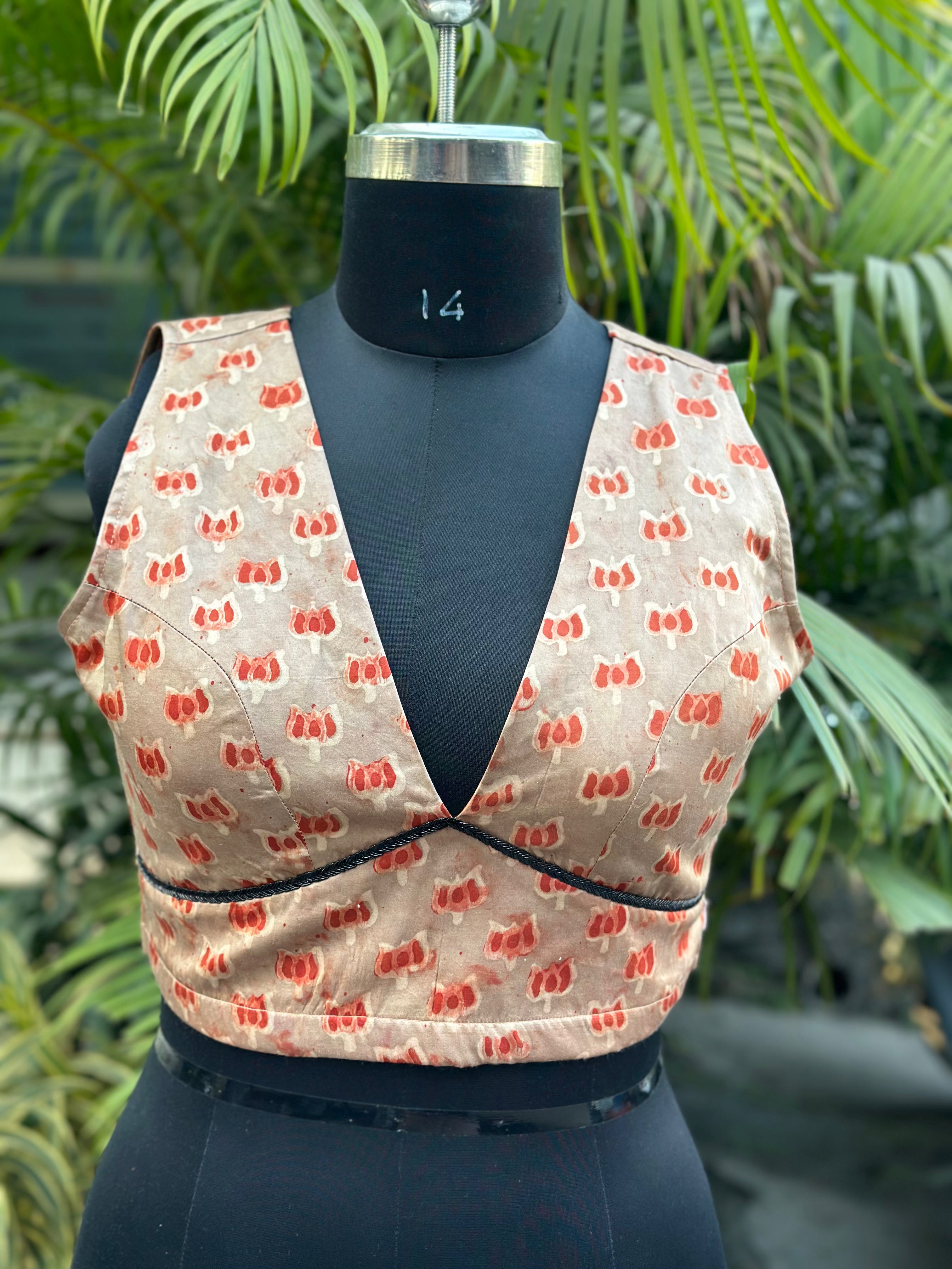 Rust-terracotta lotus motifs vanaspati handblock printed modal satin deep neck blouse