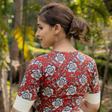 White cotton blouse with red kalamkari print on sleeves