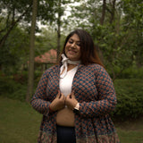 Sea green sanganeri peplum style shrug