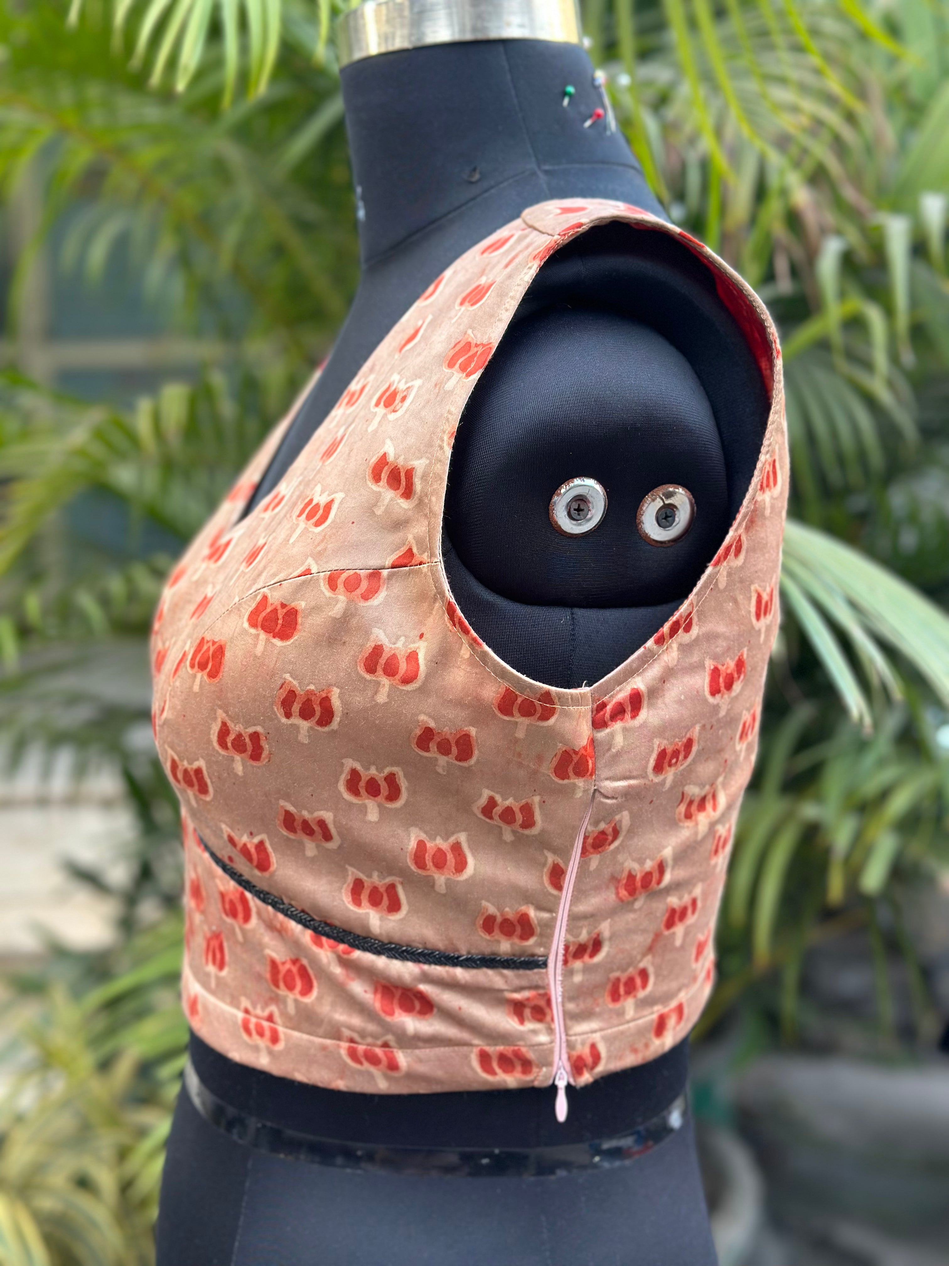 Rust-terracotta lotus motifs vanaspati handblock printed modal satin  deep neck blouse