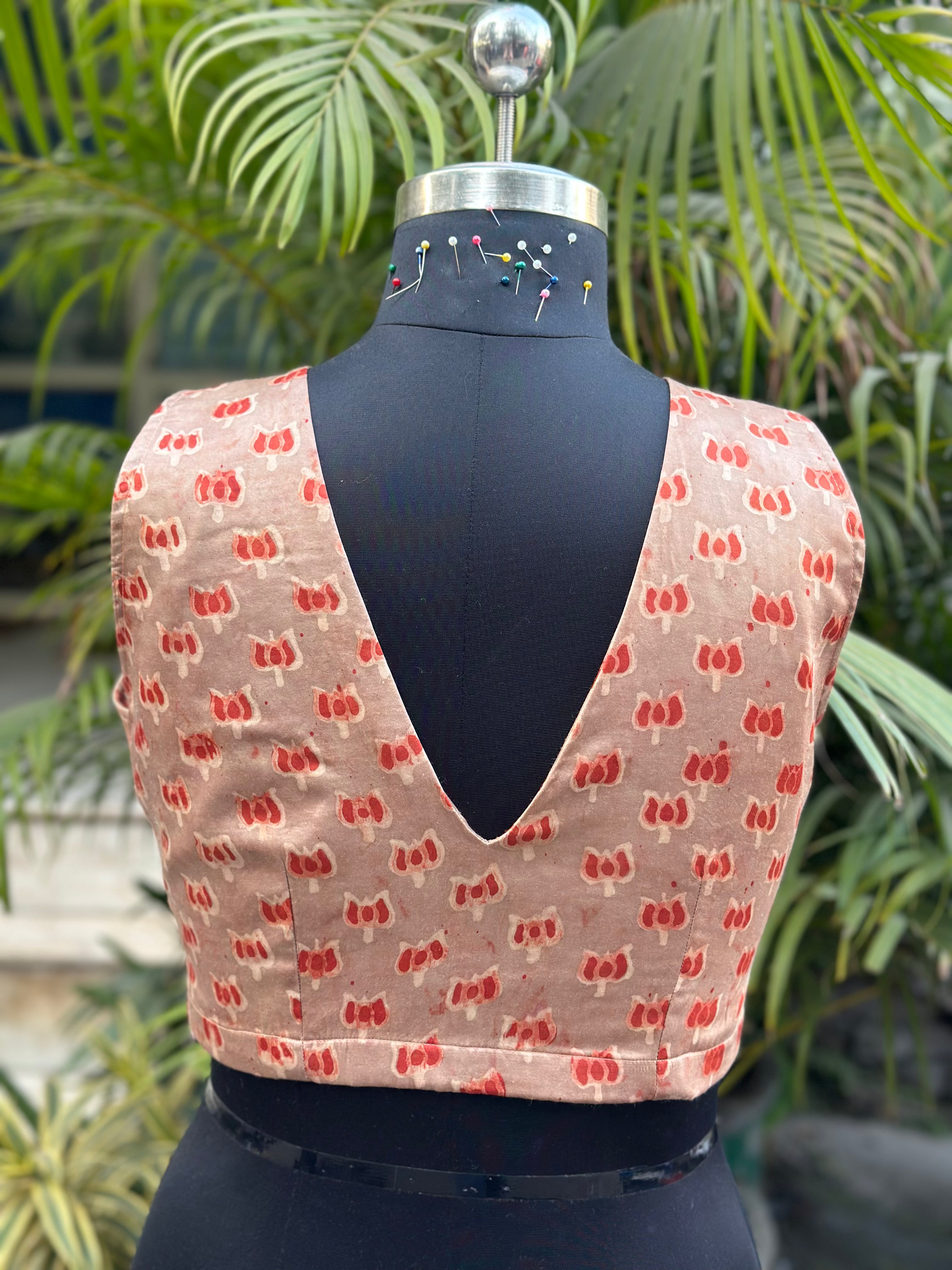 Rust-terracotta lotus motifs vanaspati handblock printed modal satin  deep neck blouse
